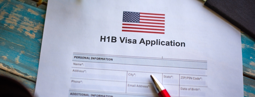 Illustrative picture showing application for United States of America work visa H1B with pen