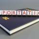 A 3D rendering of a passport and the word 'DEPORTATION'