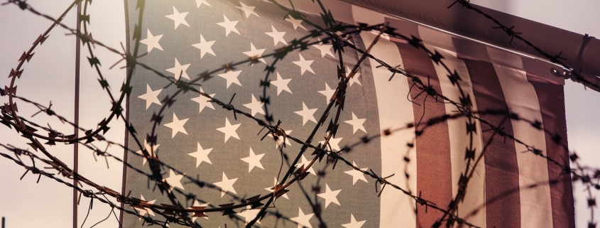 American flag and barbed wire, USA border