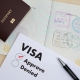 Visa application form to travel Immigration a document Money for Passport Map and travel plan